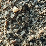 Cát nhìn qua kính lúp