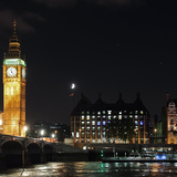Big Ben at night with the Moon in the background